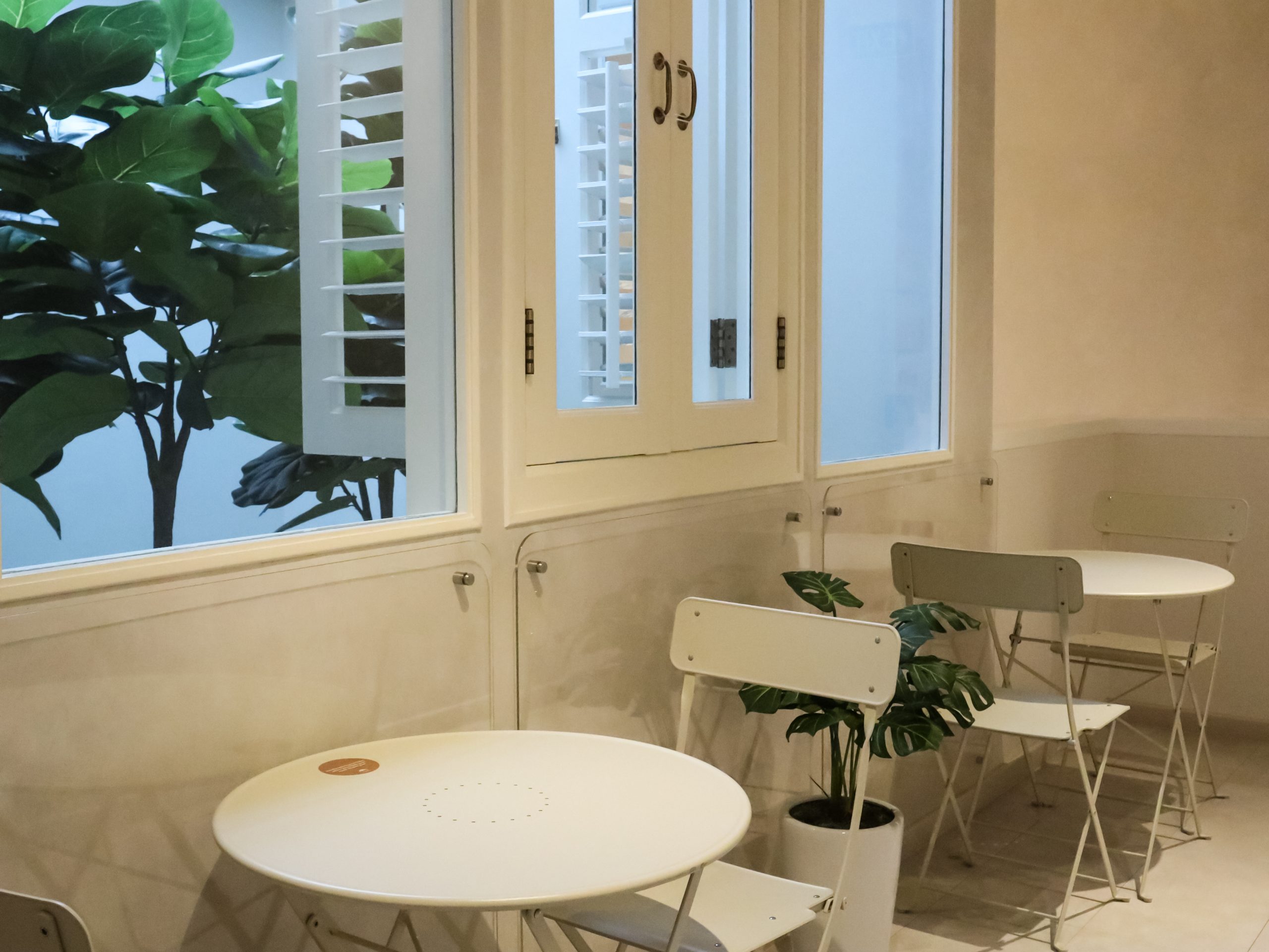 claire_three-new-cafes-tanjong-pagar-champion-bolo-bun-7-sitting-area-warm-natural-lighting